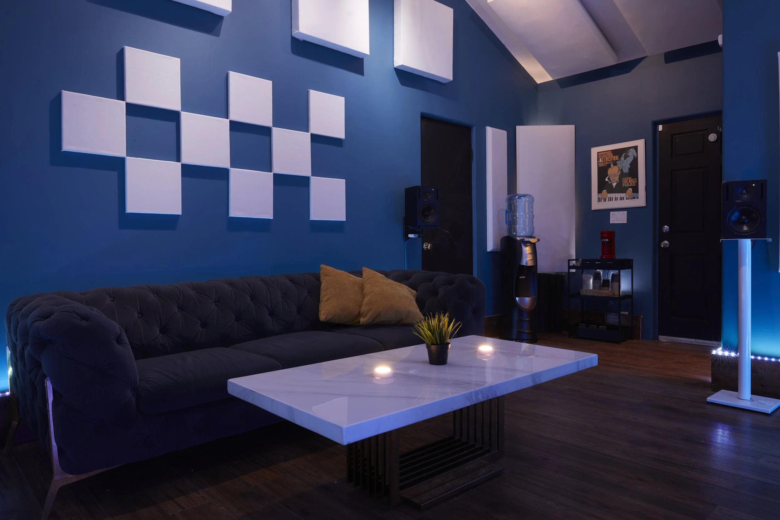 Control-room seating and Genelec monitoring setup